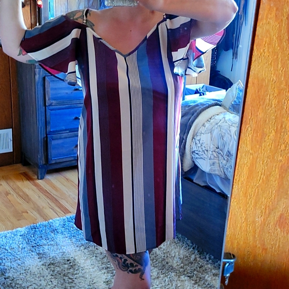 NBW cold shoulder striped mini dress.